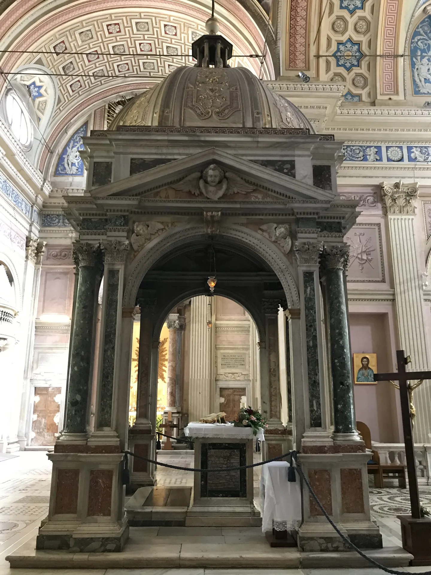 Marble aedicule shrine of Saint Alexius holding a relic staircase inside Sant'Alessio.
