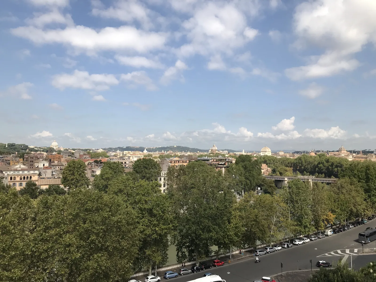 View over Rome's rooftops and distant hills from the Aventine Hill.