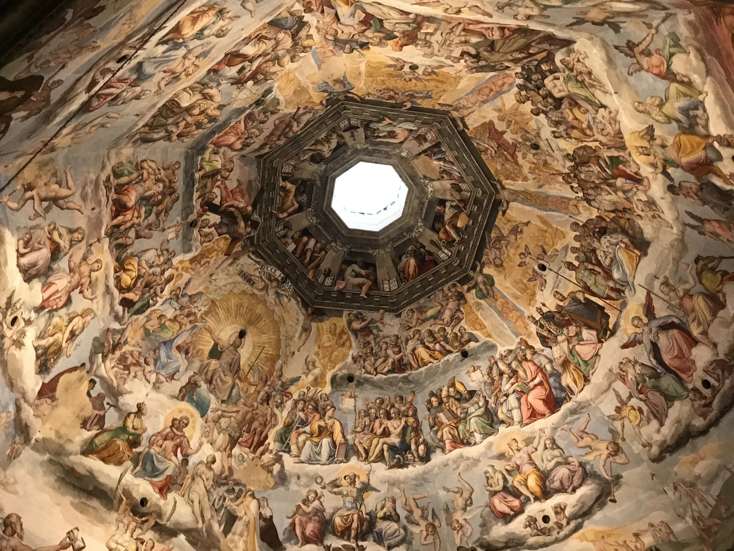 The Last Judgment frescoed inside Brunelleschi's dome by Vasari and Zuccari, ringing the central oculus