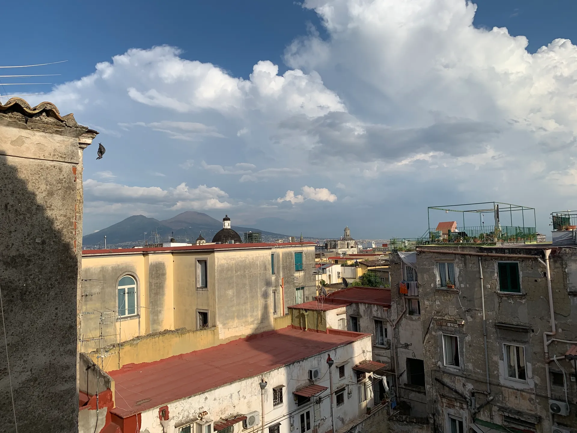 Naples rooftops and terraces with Mount Vesuvius on the horizon