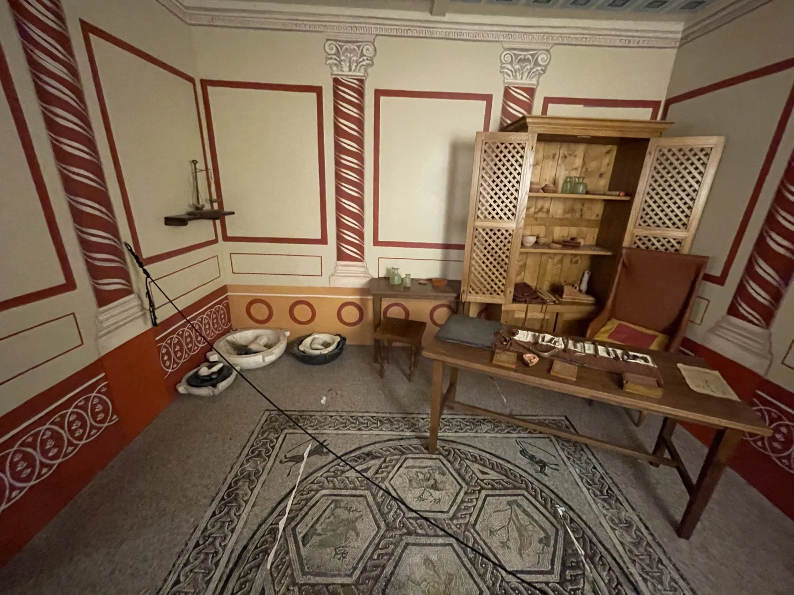Wide view of the reconstructed Roman surgeon's room at the Domus del Chirurgo Rimini