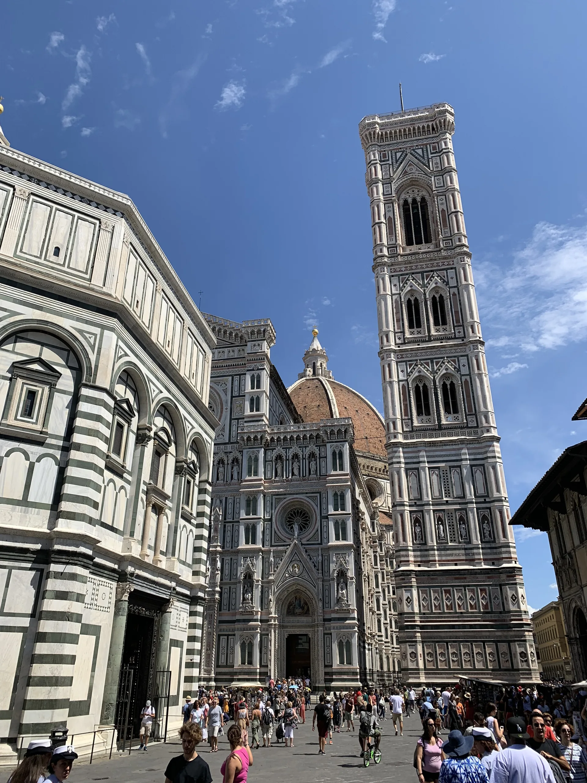 The Baptistery, Giotto's campanile and Brunelleschi's dome seen together across Piazza del Duomo