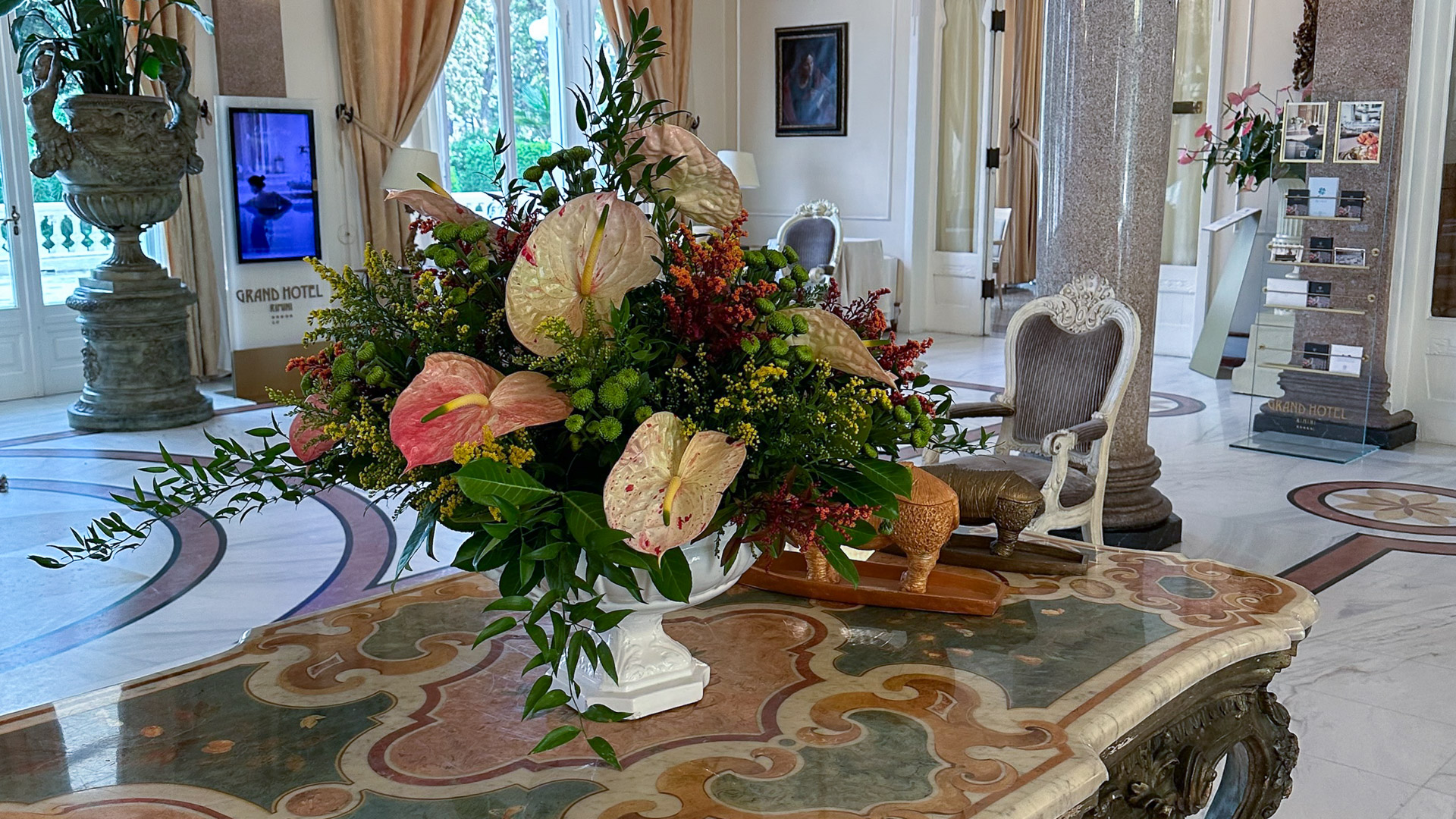 Inlaid marquetry console table in the lobby of the Grand Hotel Rimini