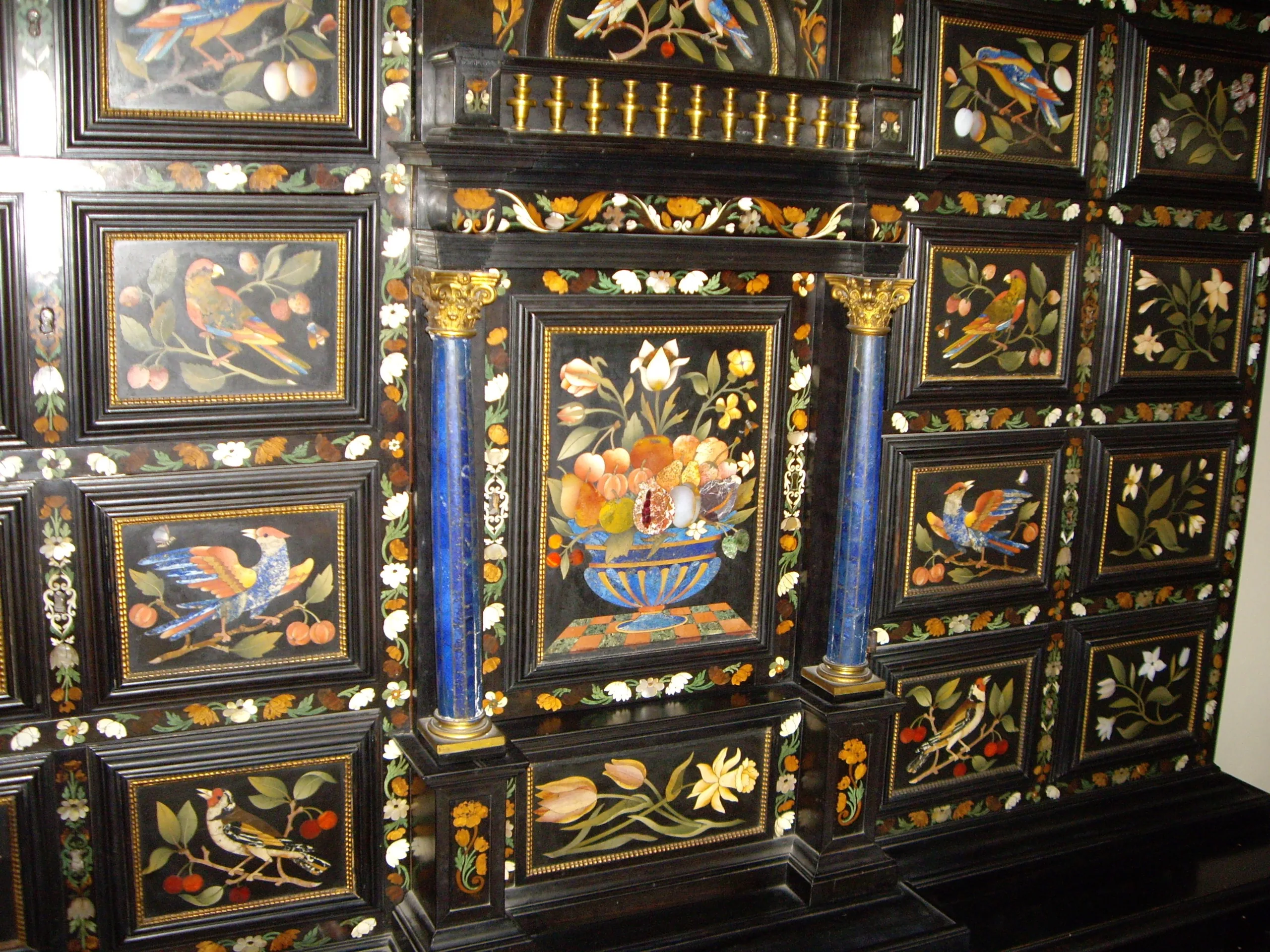 An ebony cabinet inlaid with pietra dura birds, flowers and fruit in the Palazzo Vecchio apartments