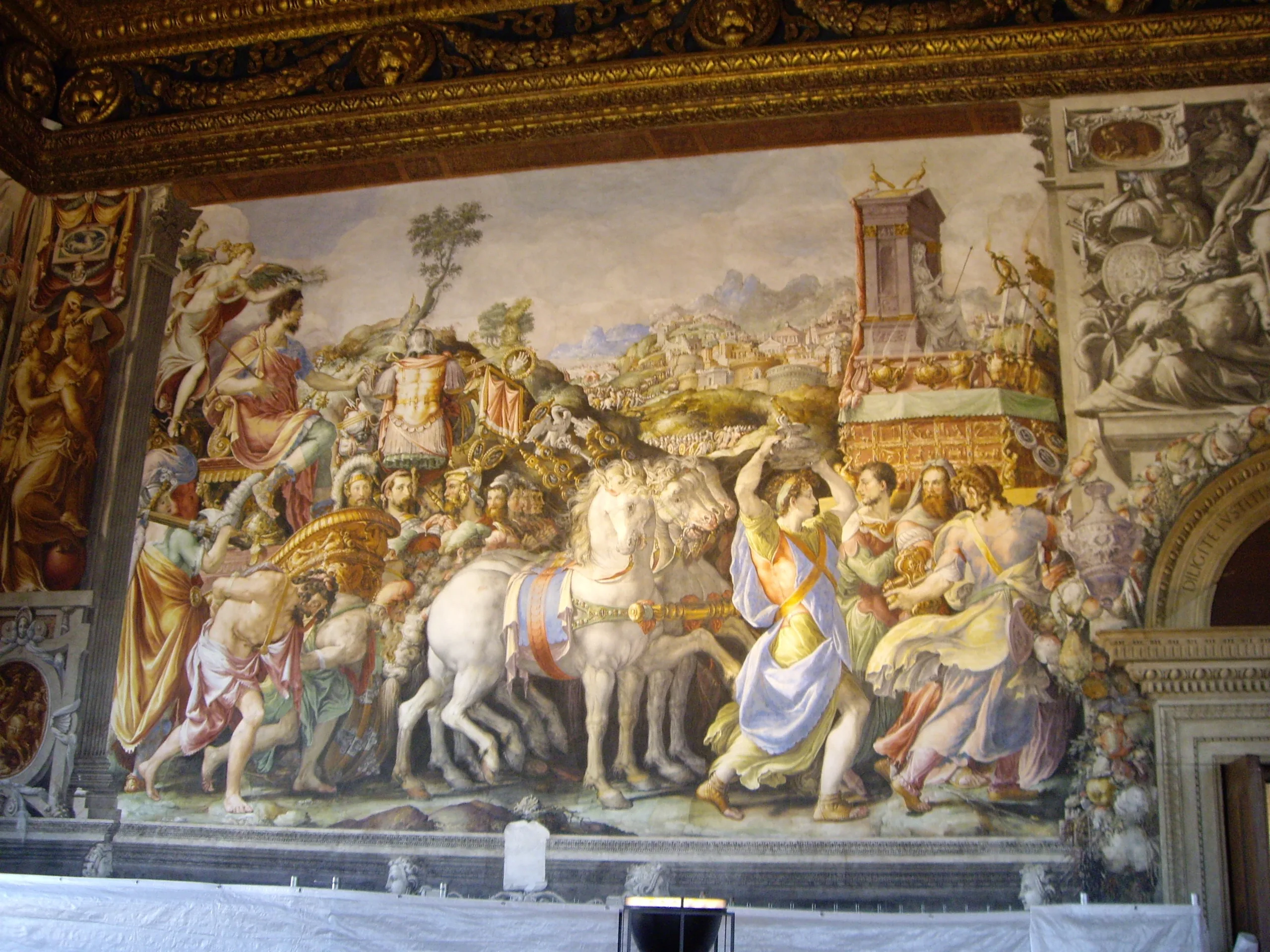 A frescoed triumphal procession in the Medici apartments of the Palazzo Vecchio