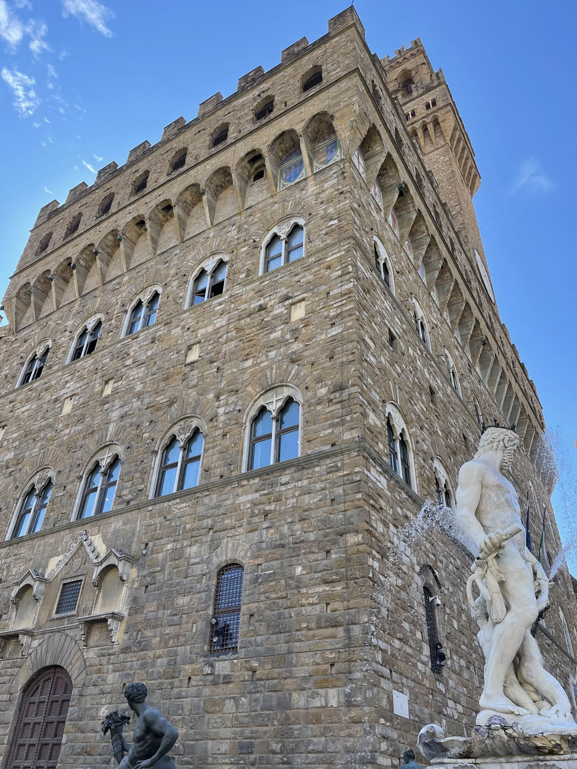 The upper gallery and crenellations of the Palazzo Vecchio in close view