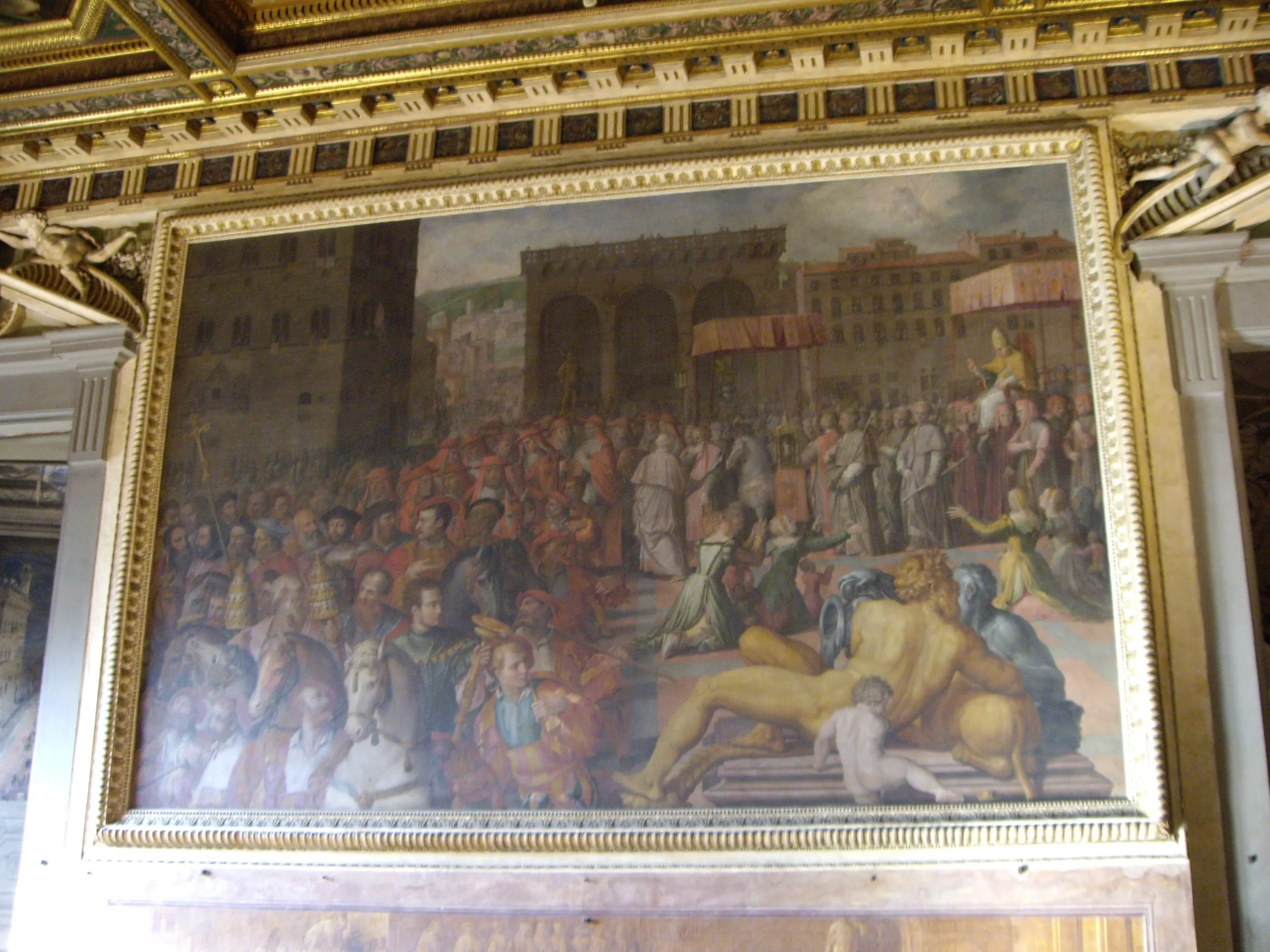 A wall-sized Vasari battle fresco in the Salone dei Cinquecento celebrating a Florentine victory