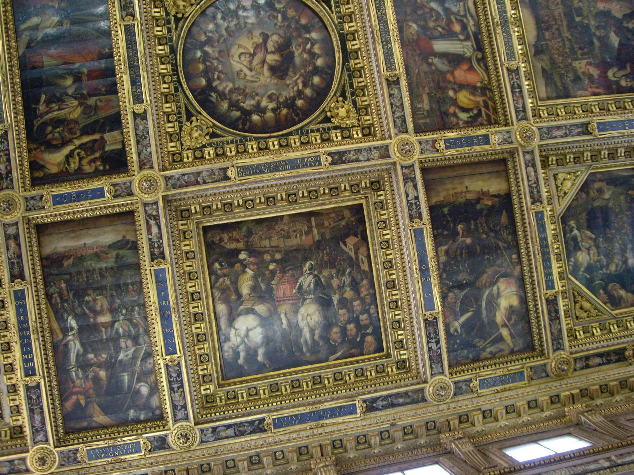 The gilded coffered ceiling of the Salone dei Cinquecento, painted with the deeds of Florence by Vasari and his workshop
