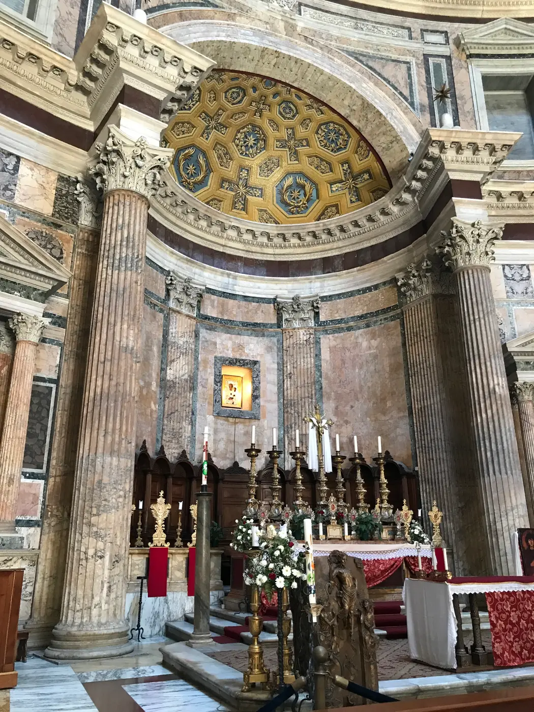 High altar of the Pantheon beneath the gilded semi dome of the apse