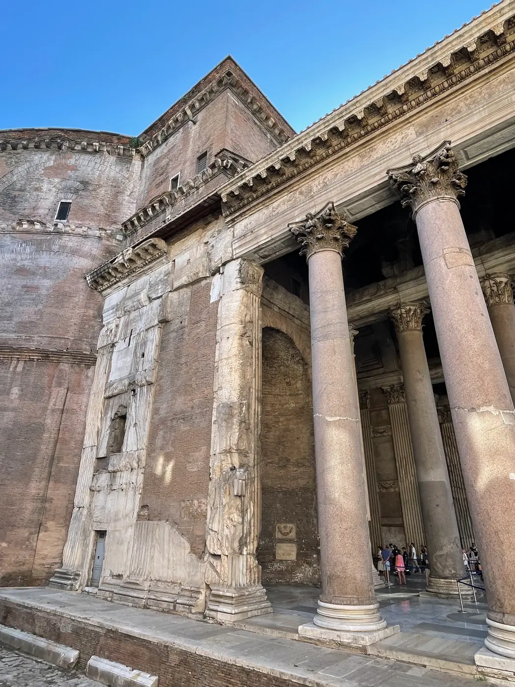 Side of the Pantheon portico showing the outline of the unbuilt higher pediment against the rotunda