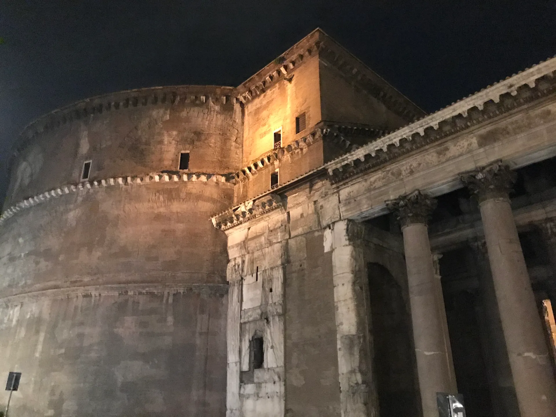 Floodlit rotunda and portico junction of the Pantheon at night
