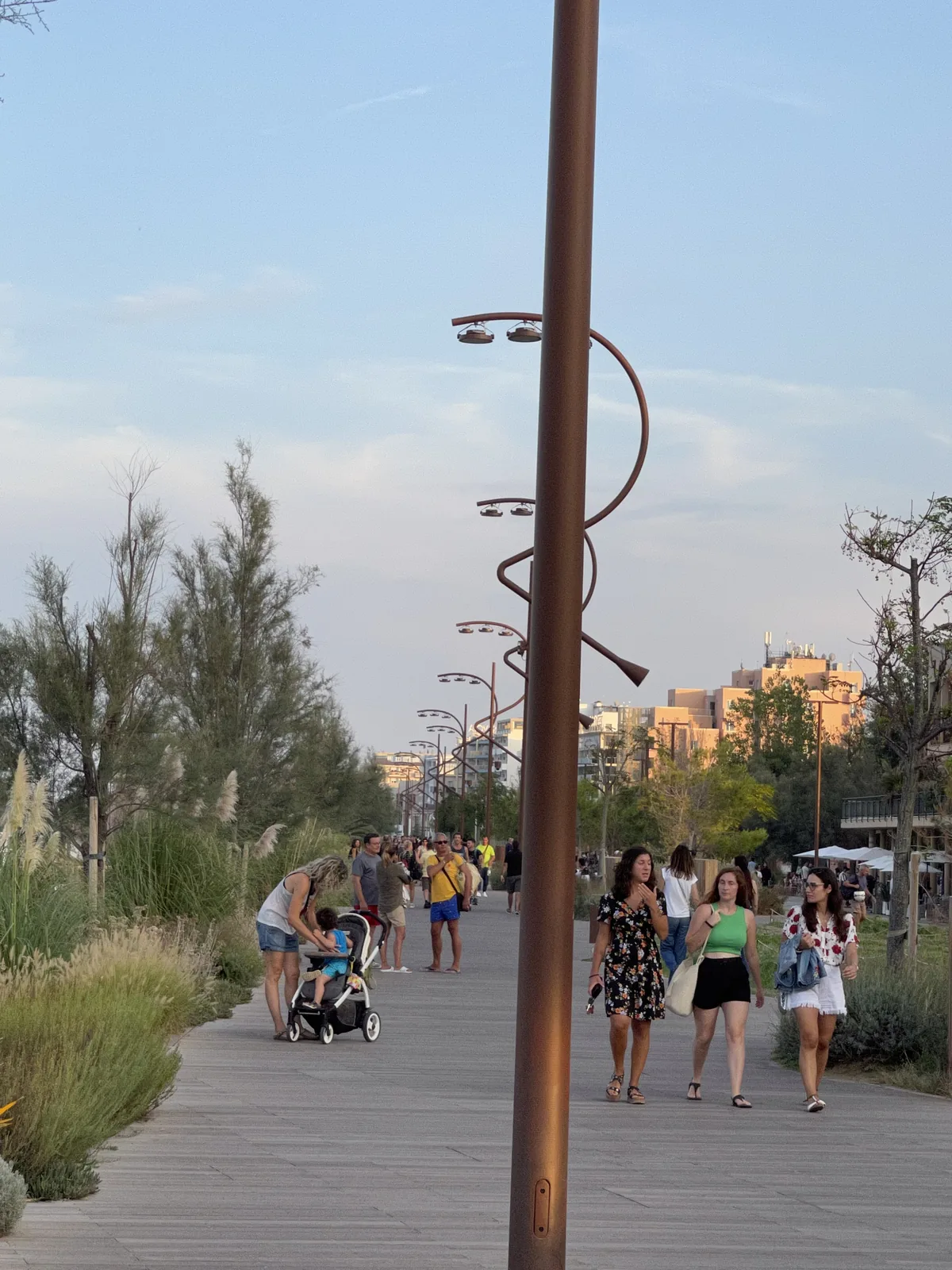 Timber boardwalk and dune grass on the Rimini Parco del Mare seafront