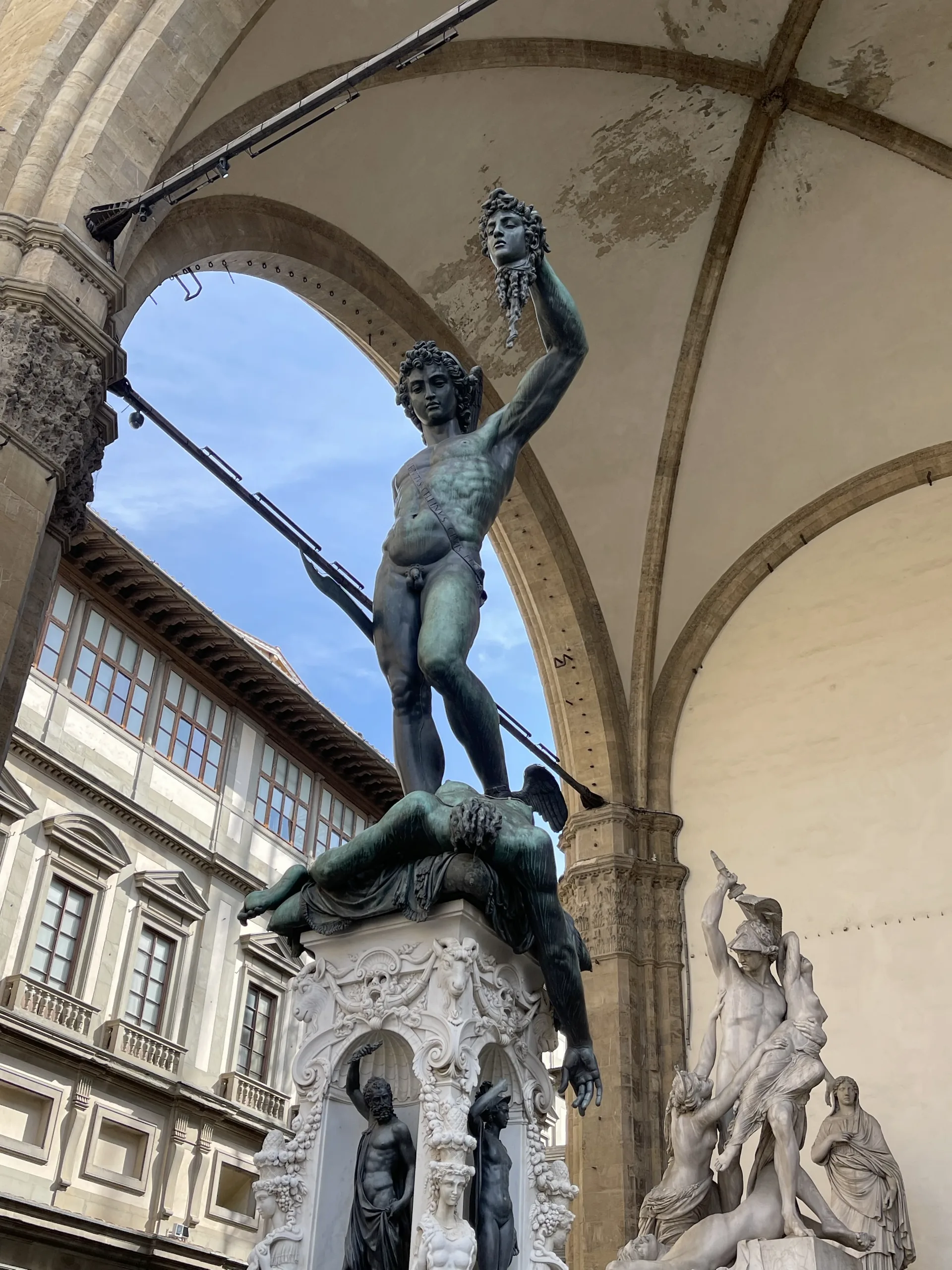 Cellini's Perseus seen through the arches of the Loggia dei Lanzi on Piazza della Signoria