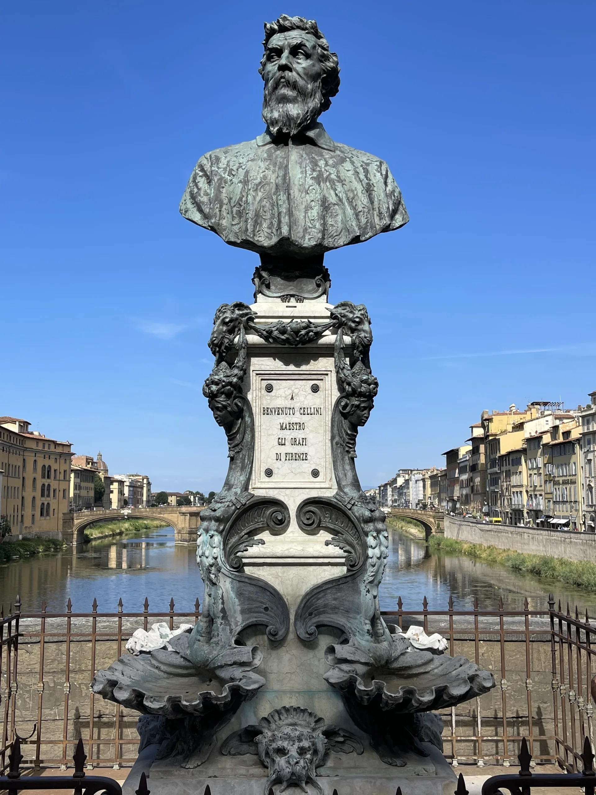 The bronze bust of Benvenuto Cellini at the center of the Ponte Vecchio, patron of its goldsmiths