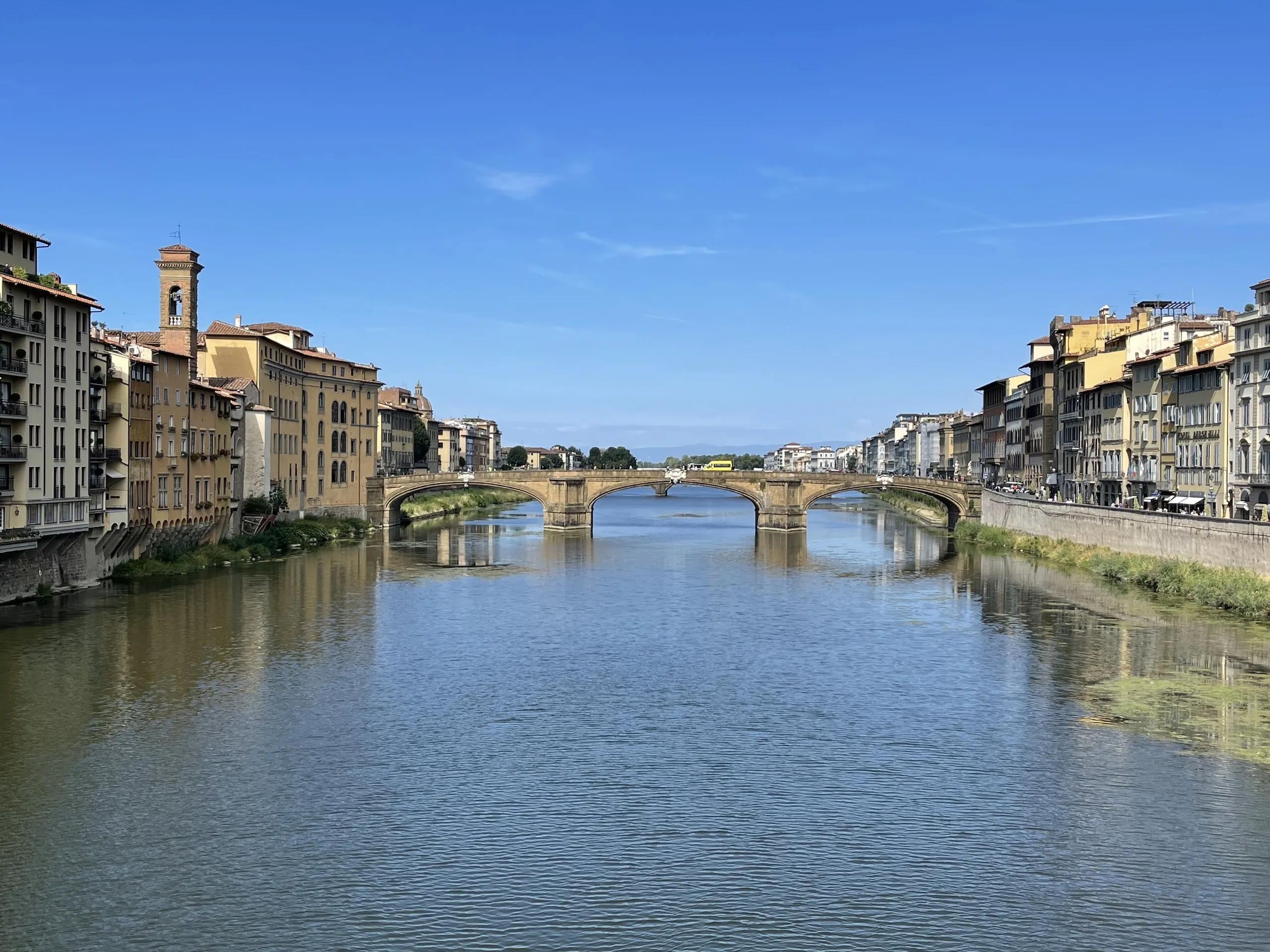 A wide view up the Arno with the Ponte Vecchio spanning the river