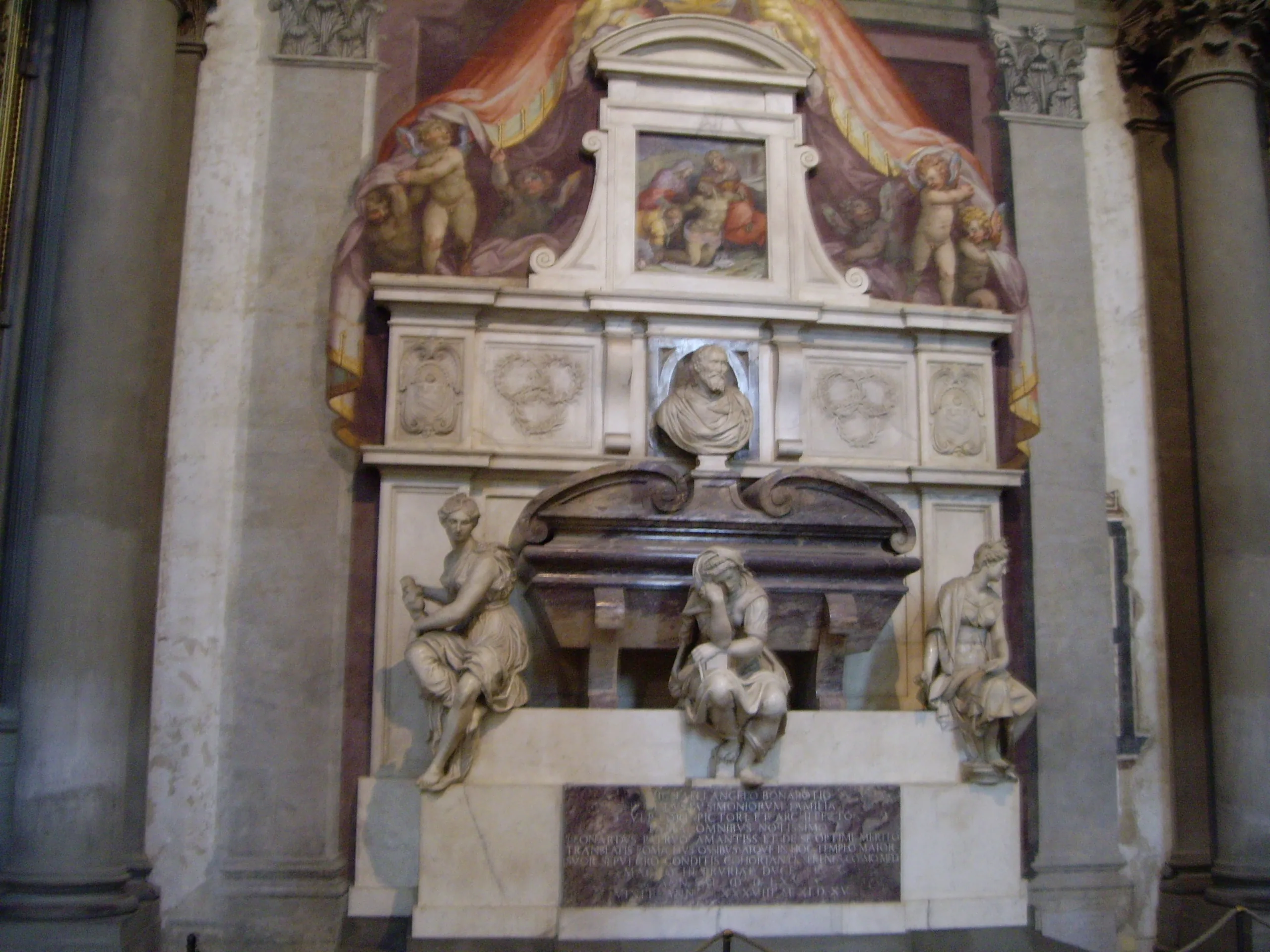 The wall tomb of Michelangelo in Santa Croce, three allegorical figures of Painting, Sculpture and Architecture mourning below his bust