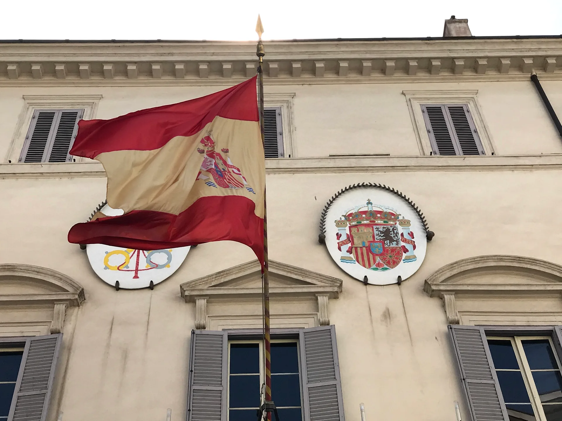 The Spanish flag and coat of arms on the Embassy to the Holy See, Piazza di Spagna.