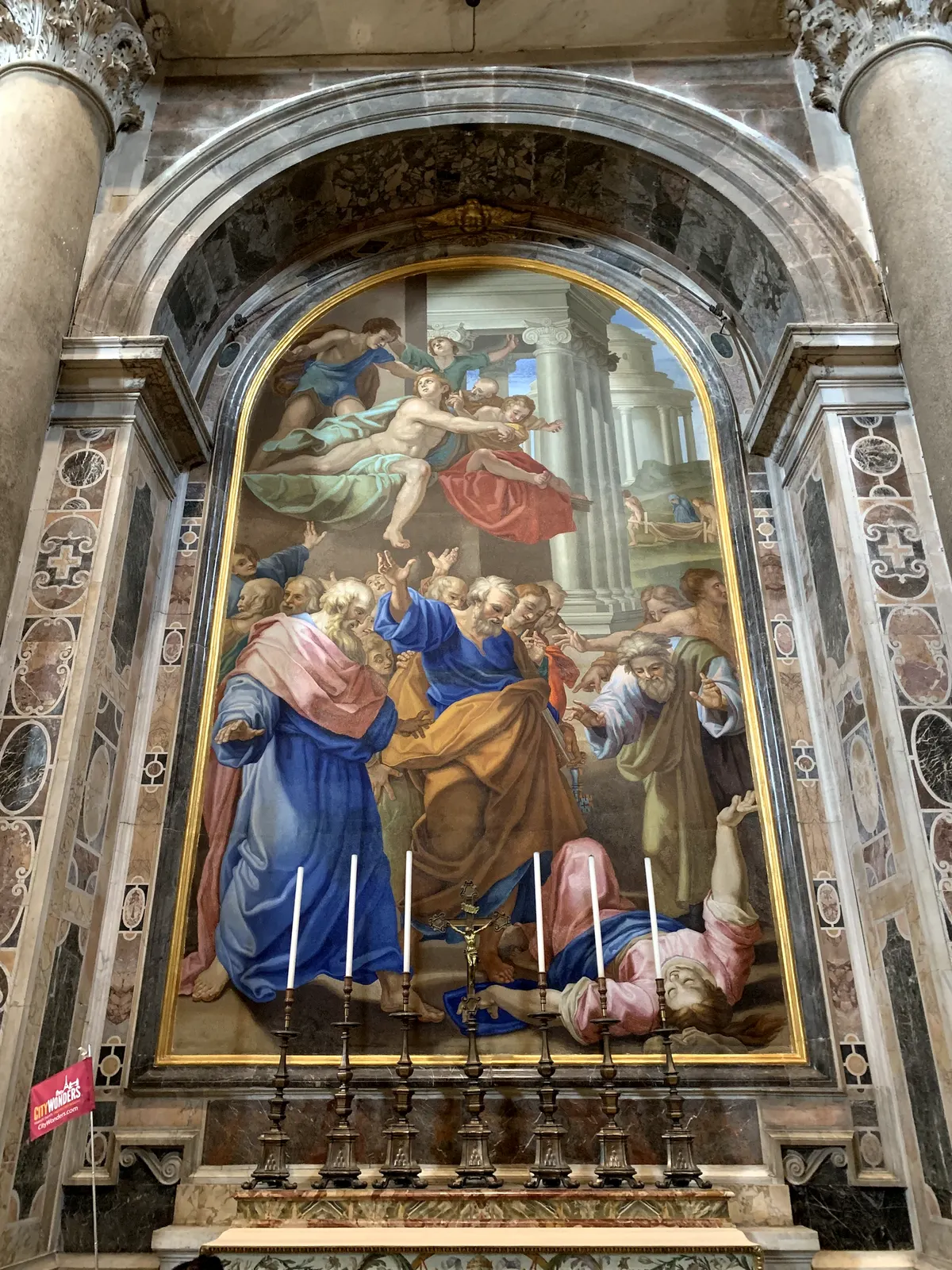 A tall mosaic altarpiece in a side chapel of St. Peter's Basilica