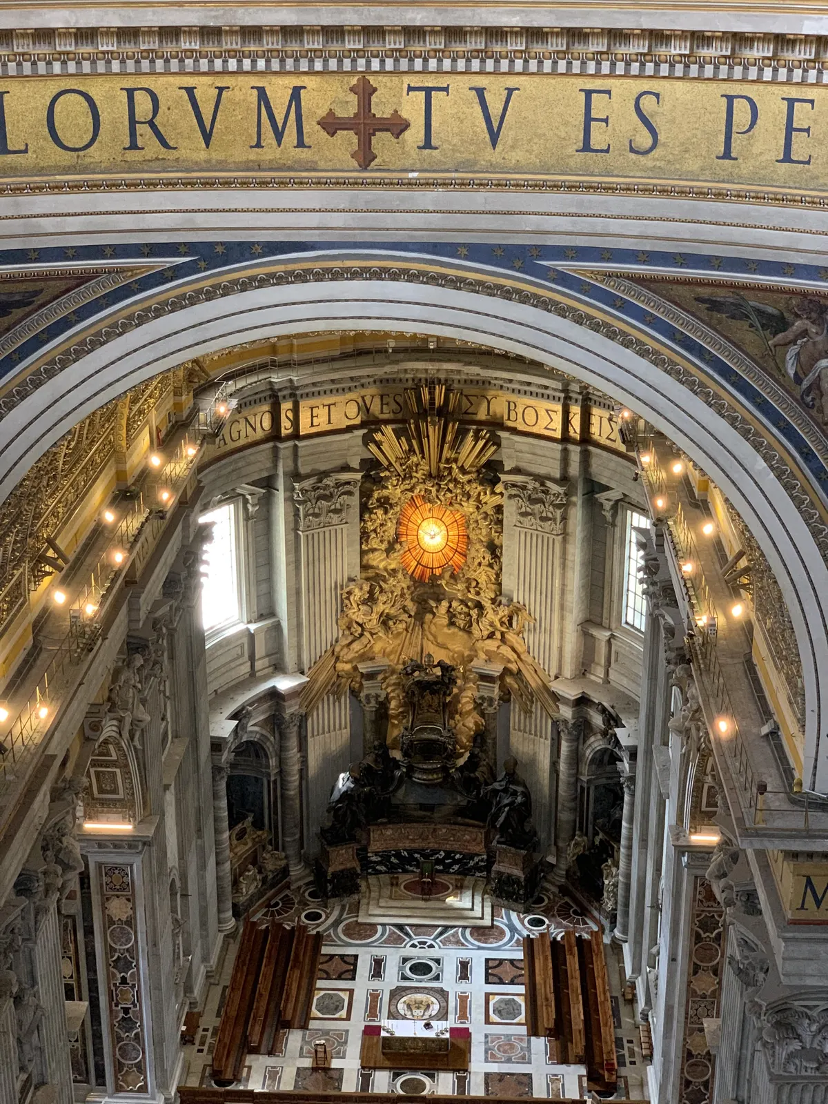 Bernini's baldachin glowing beneath the dome of St. Peter's Basilica