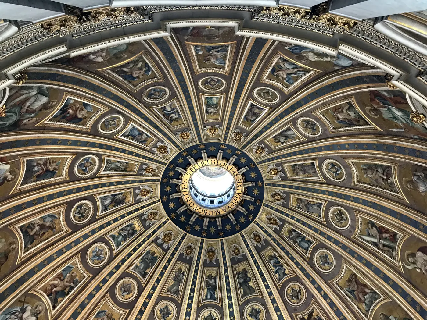 The coffered interior of the dome of St. Peter's rising to the lantern