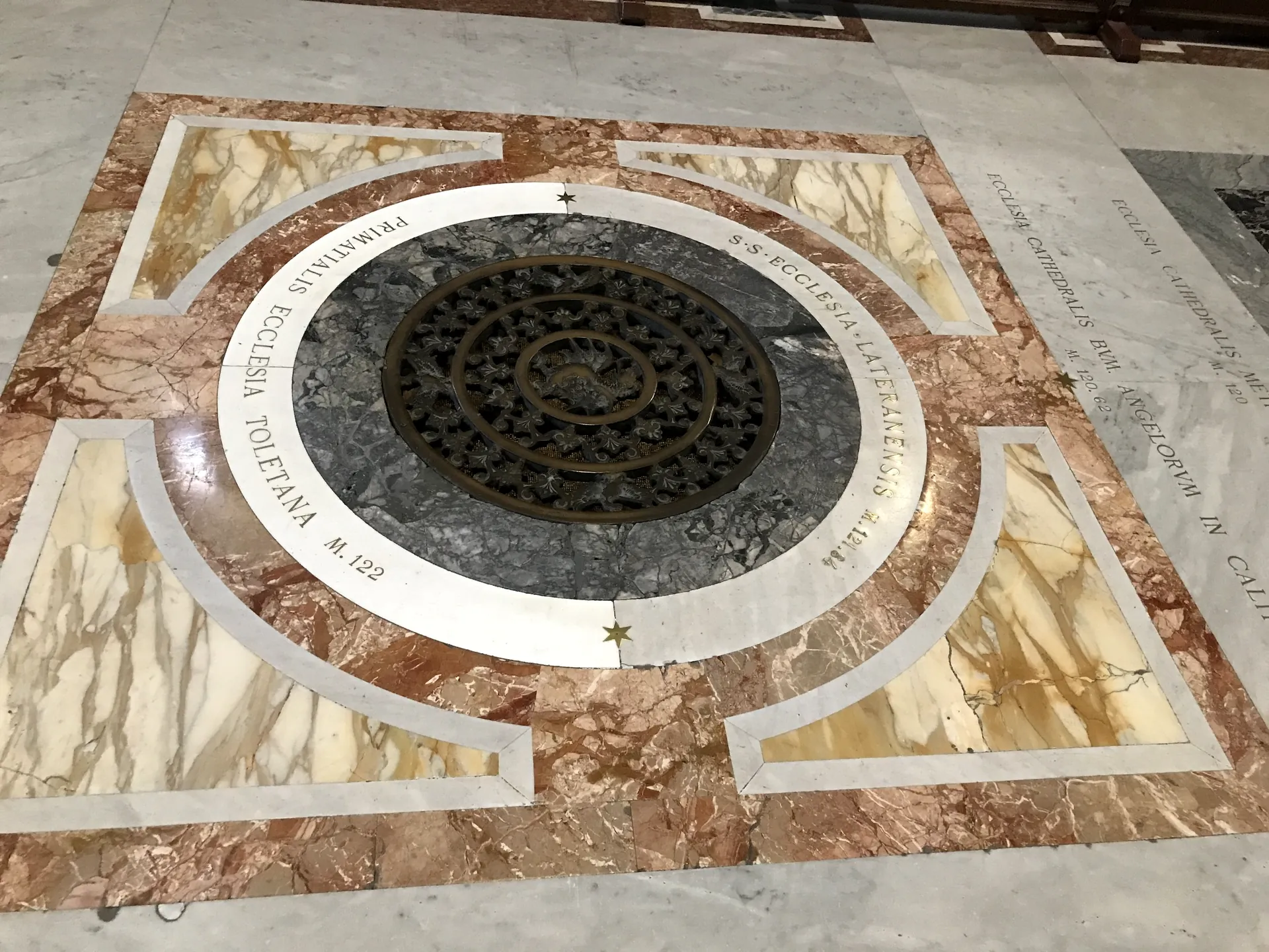 The round porphyry disc set into the marble floor of St. Peter's Basilica