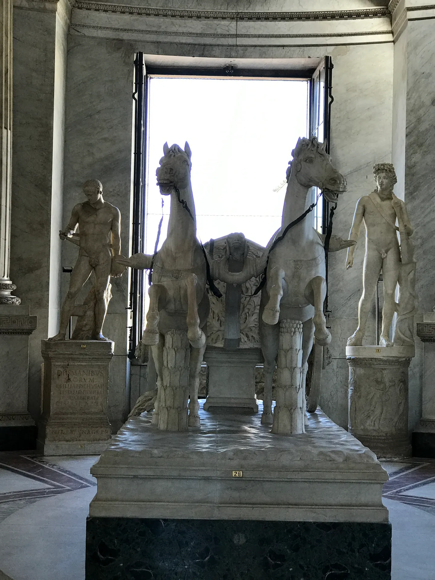 Ancient Roman marble two-horse chariot, the Chariot of Apollo, in the Vatican Museums.