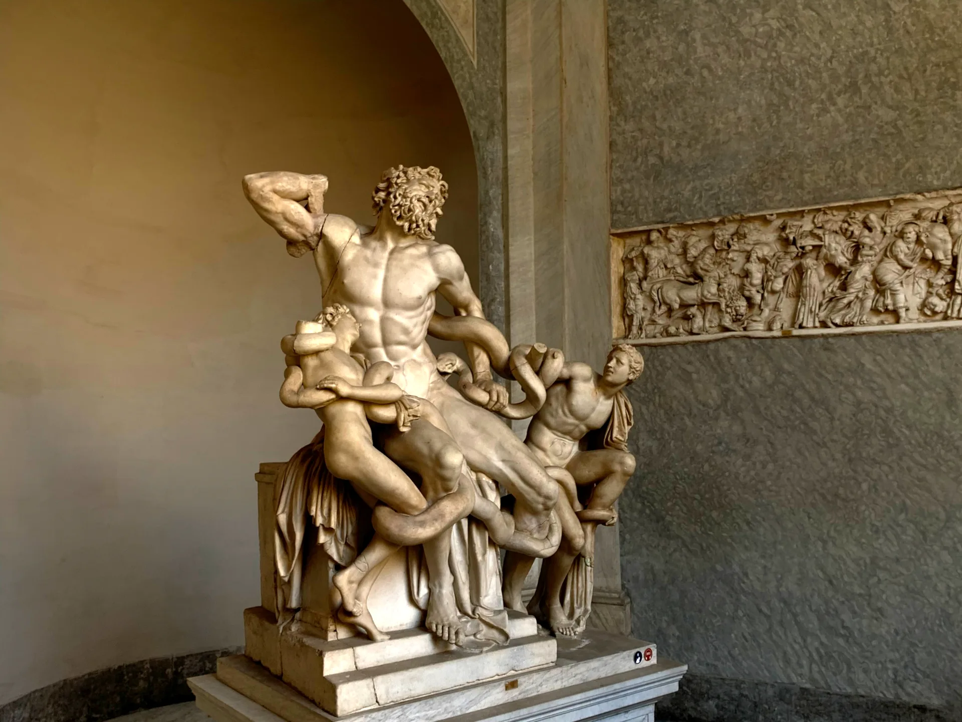 The ancient marble group of Laocoön and his sons in the Vatican Museums.