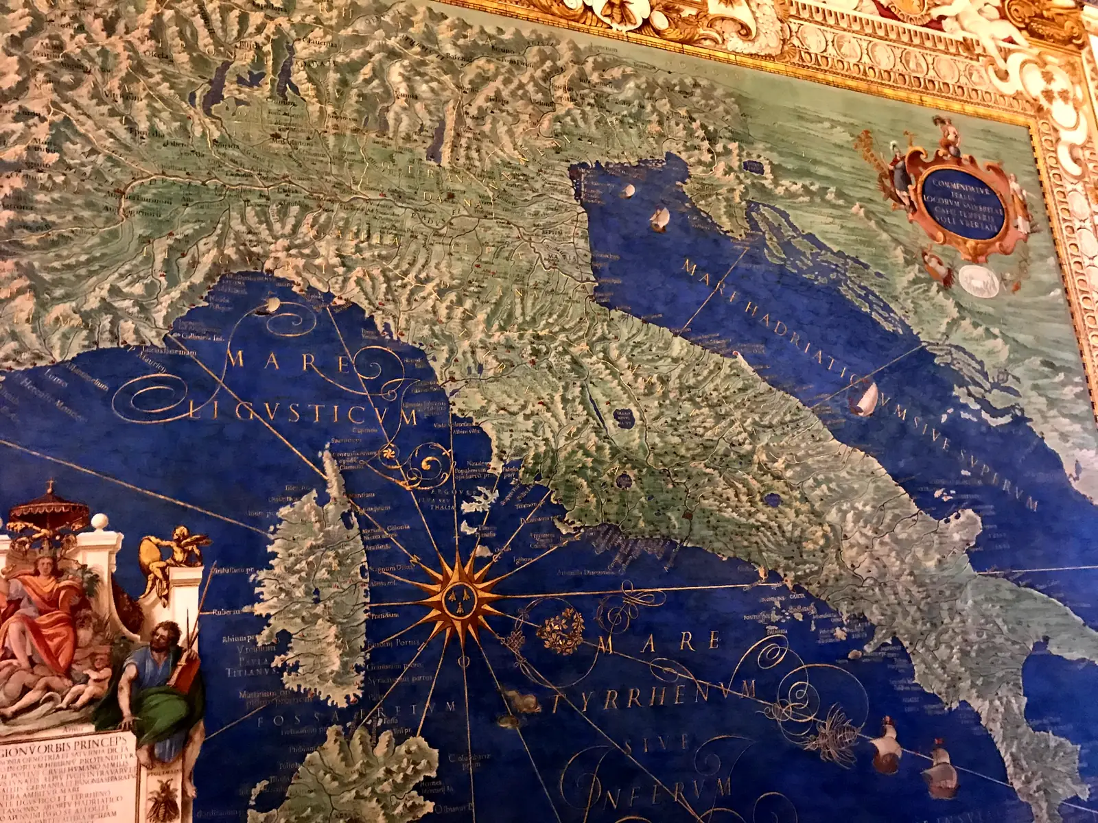 Frescoed map of the Italian peninsula with a compass rose in the Gallery of Maps.