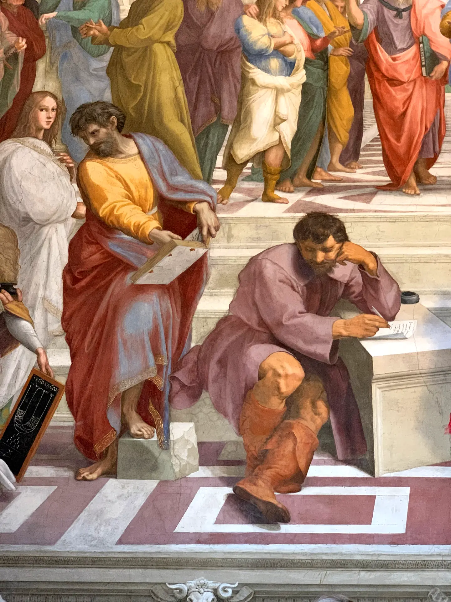 Detail of Raphael's School of Athens with Euclid and the astronomers.