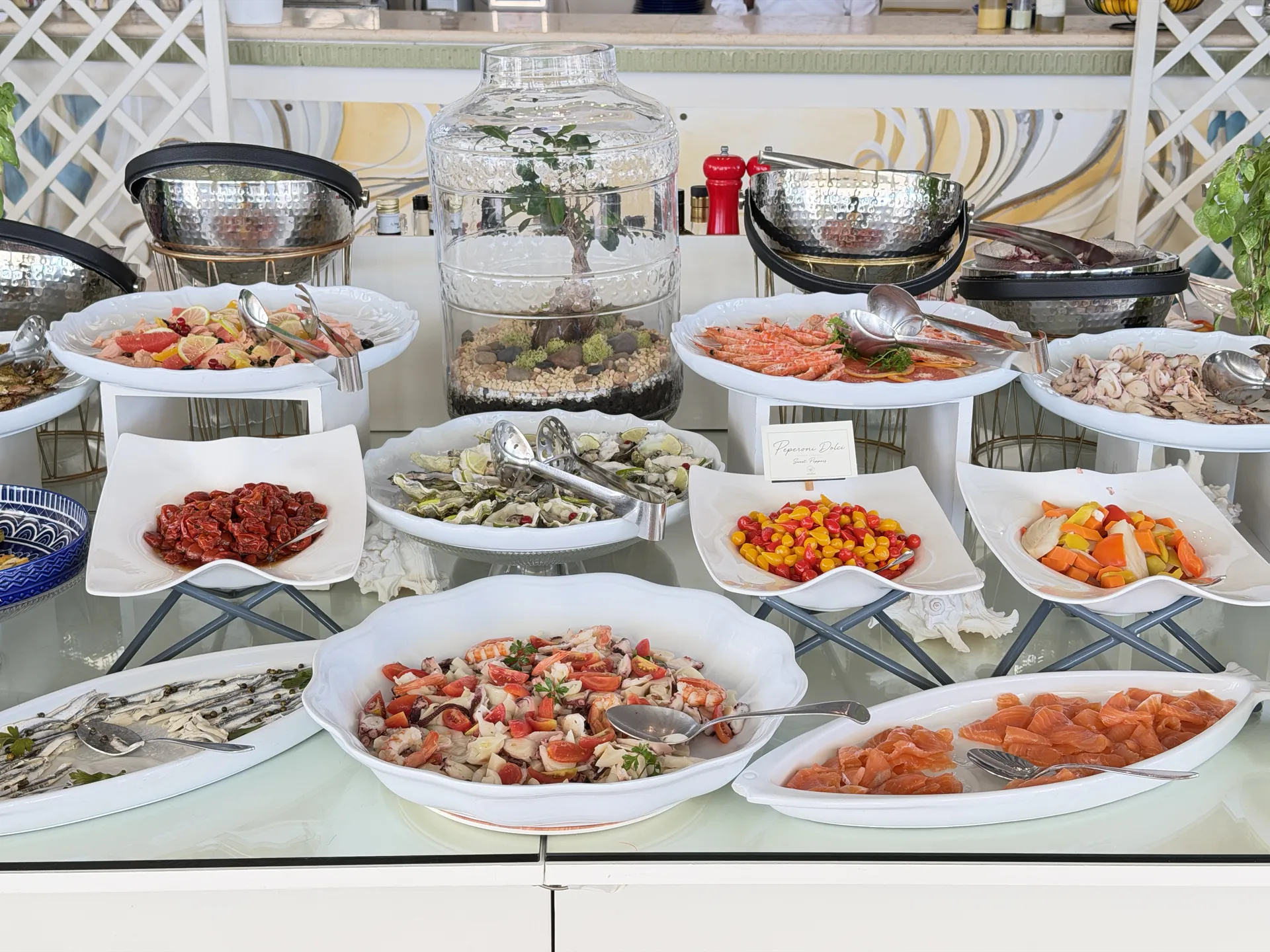 Smoked salmon, prawns, octopus and marinated anchovies on the beach buffet