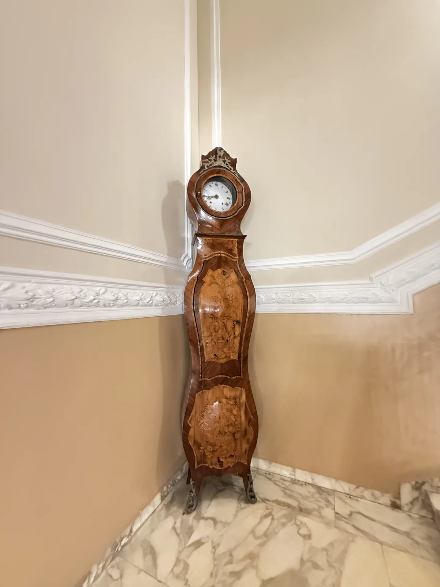 Marquetry longcase clock in a corner of the Grand Hotel Rimini