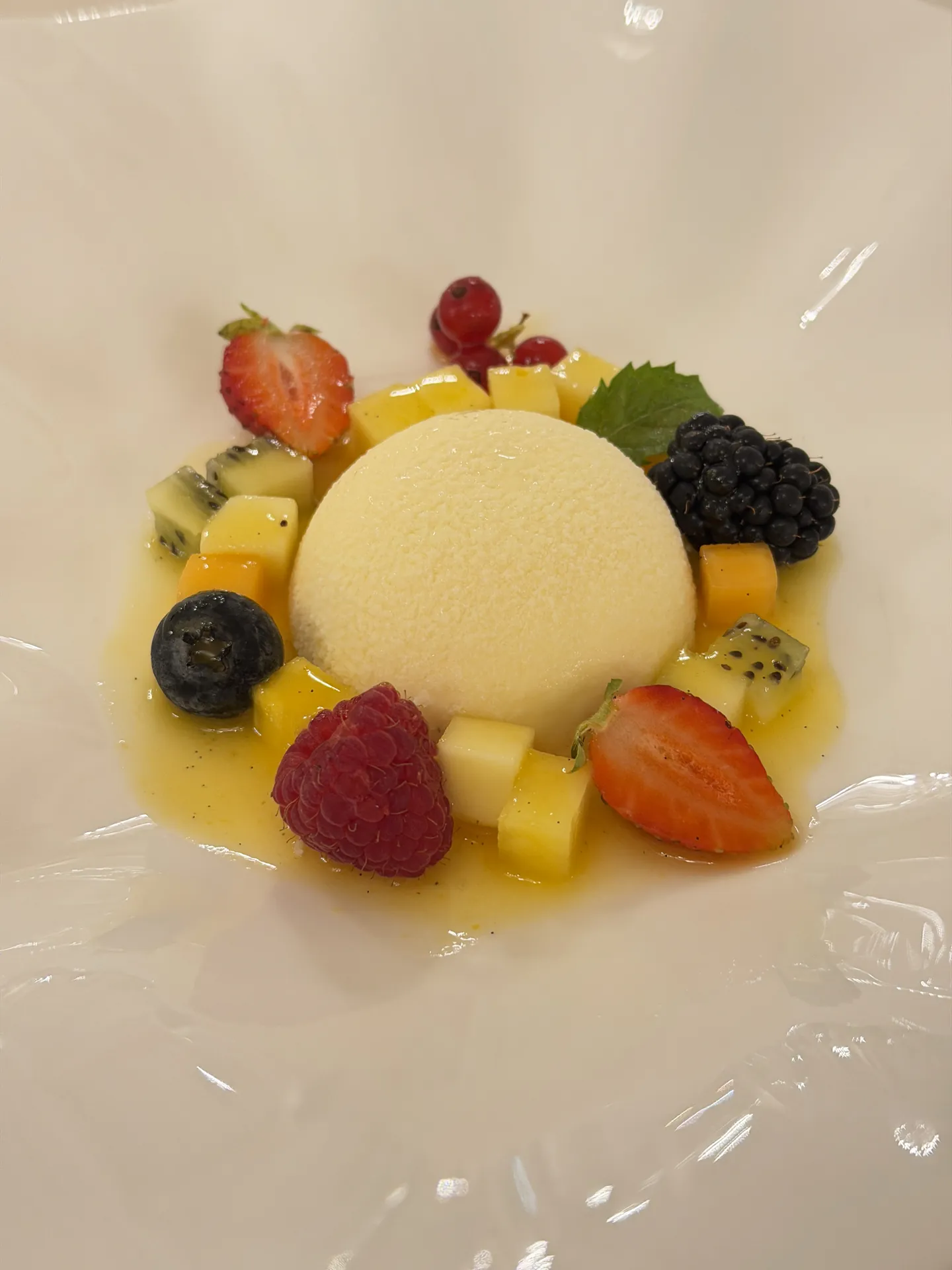 Lemon cremeux with fresh fruit and passion fruit