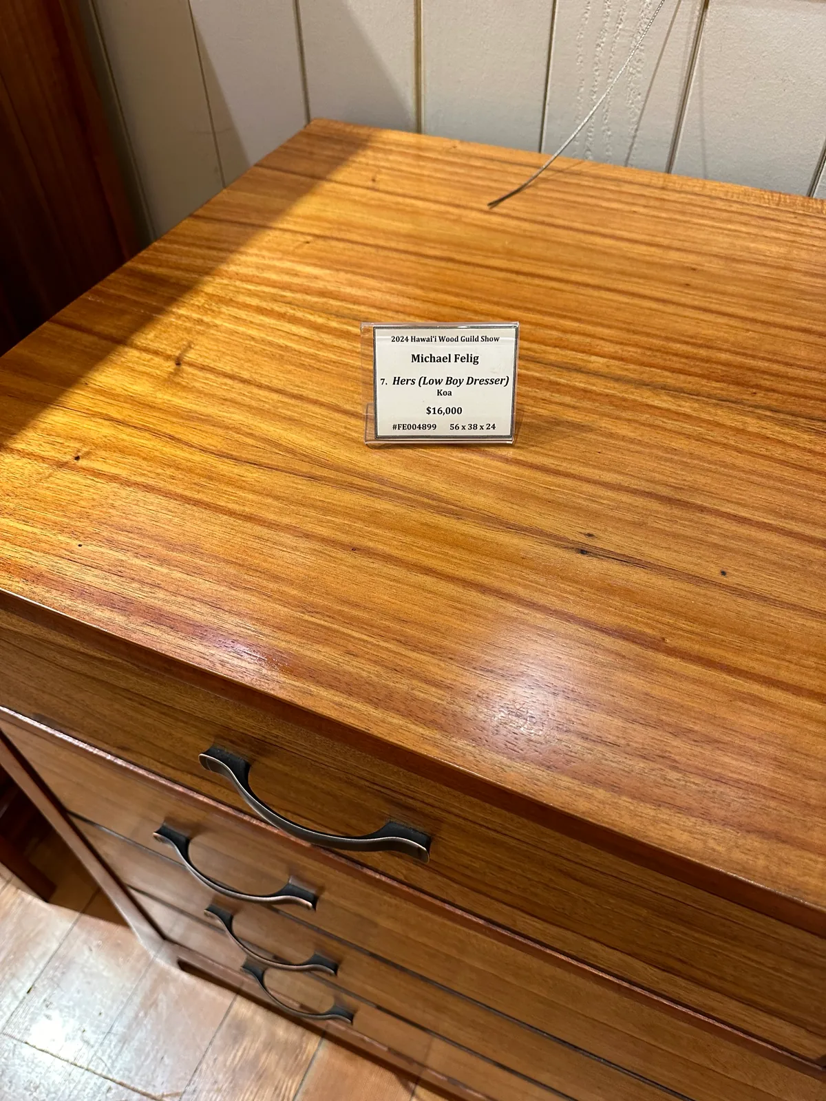 A koa wood lowboy dresser on show in Waimea