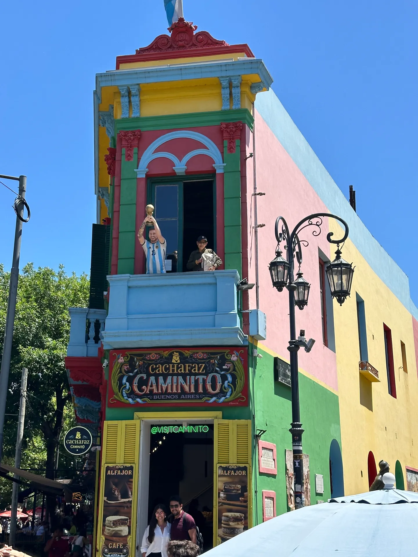 A painted facade at Caminito carrying the street's name in large letters.
