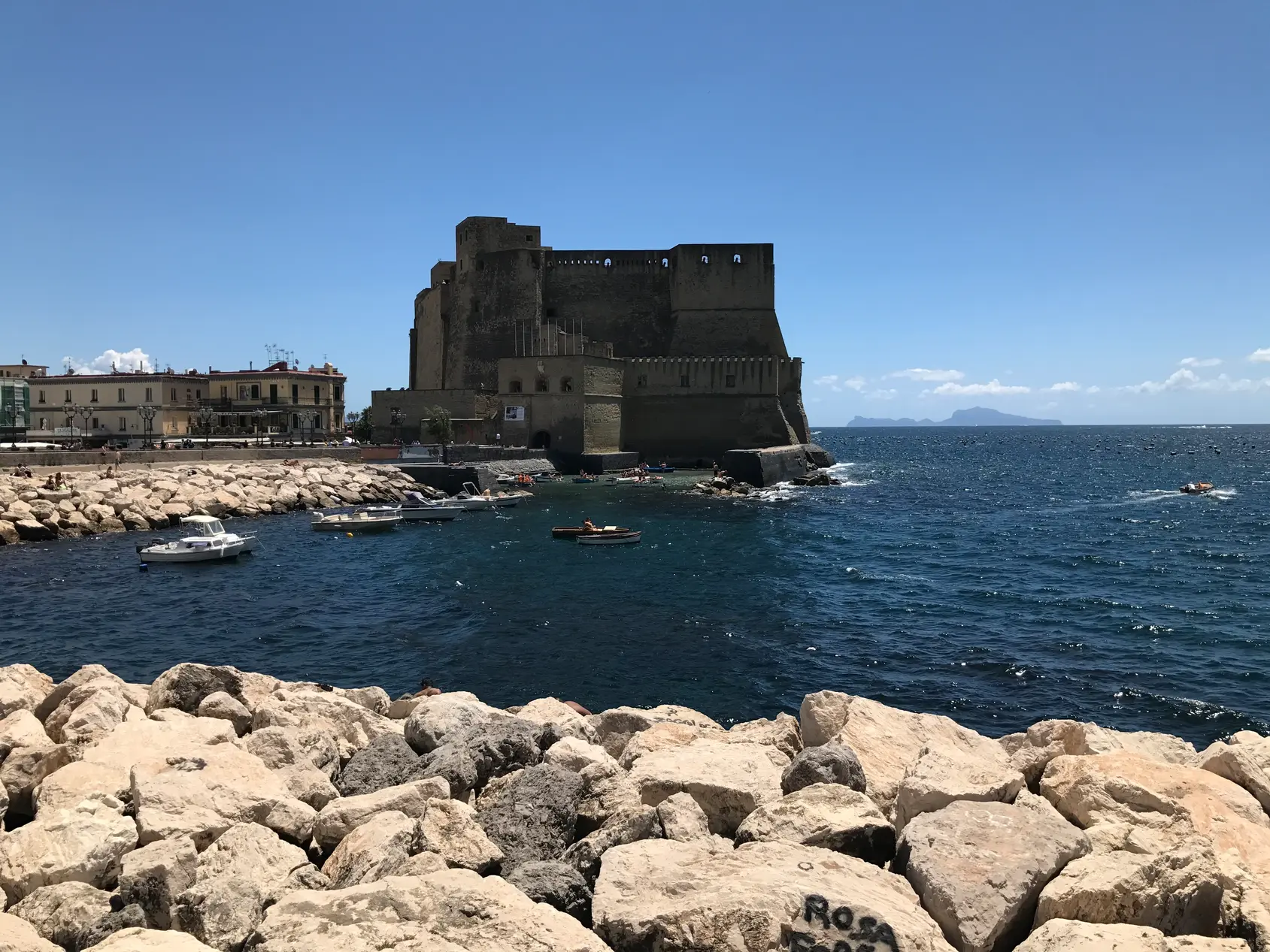 Castel dell'Ovo on the islet of Megaride seen in full profile from the Naples seafront.
