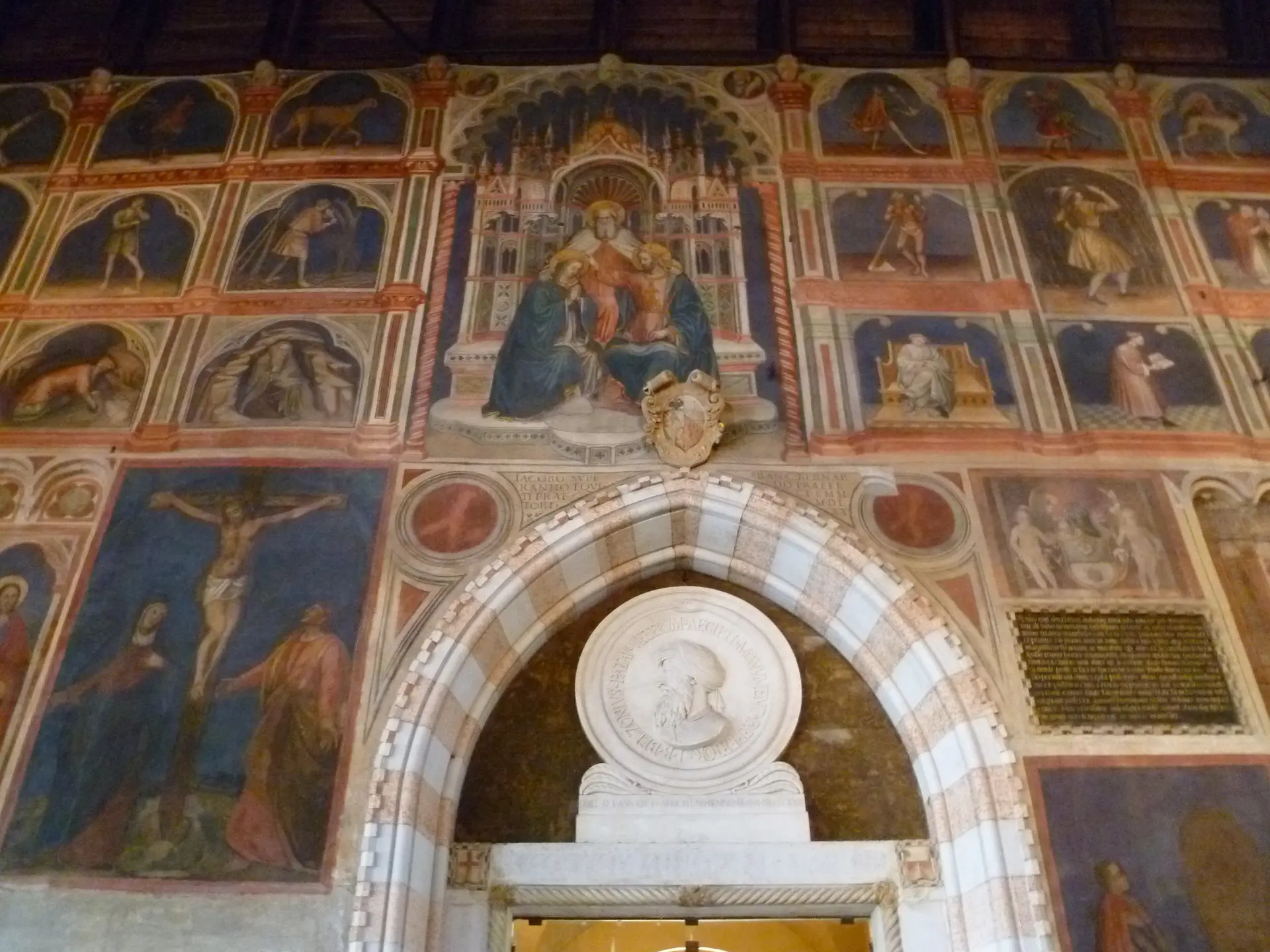 Rows of astrological frescoes and a painted Crucifixion on the wall of the Salone in Padua