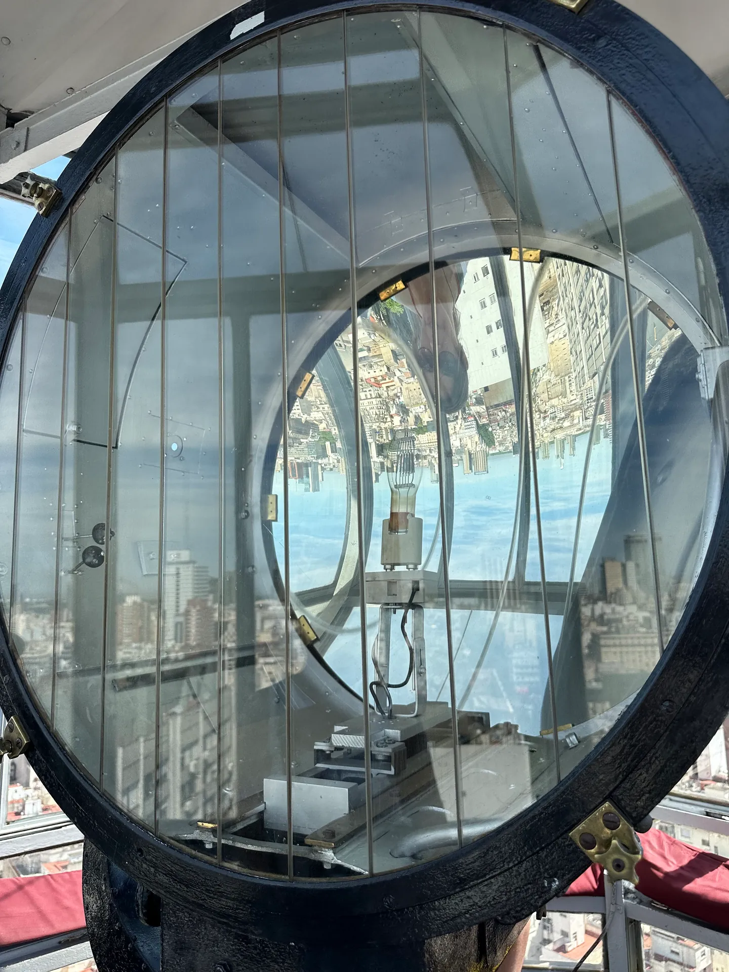 The dome of the Argentine Congress refracted through the glass of the Barolo beacon.