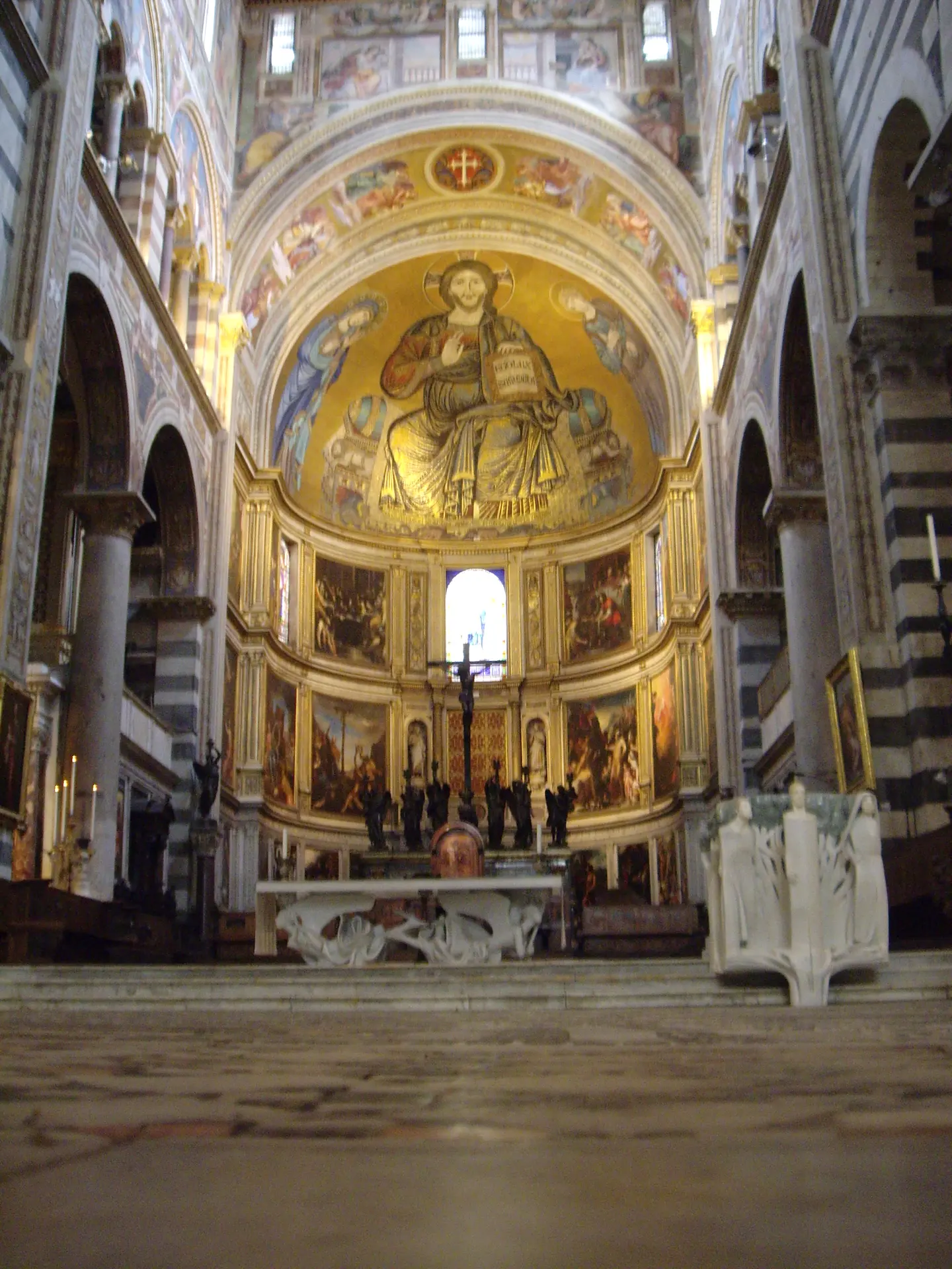 The apse of Pisa cathedral with its gold mosaic of Christ enthroned