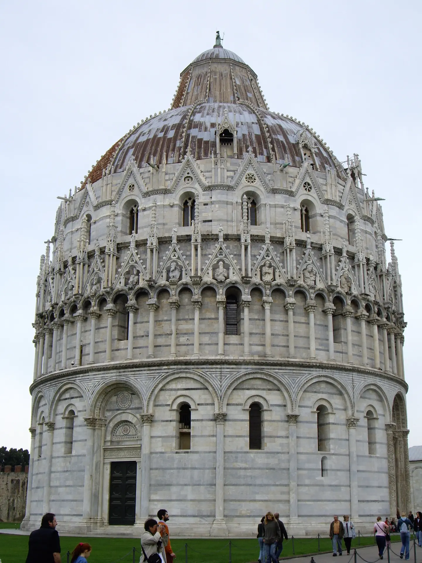 The domed marble Baptistery of Pisa seen full height from the Field of Miracles