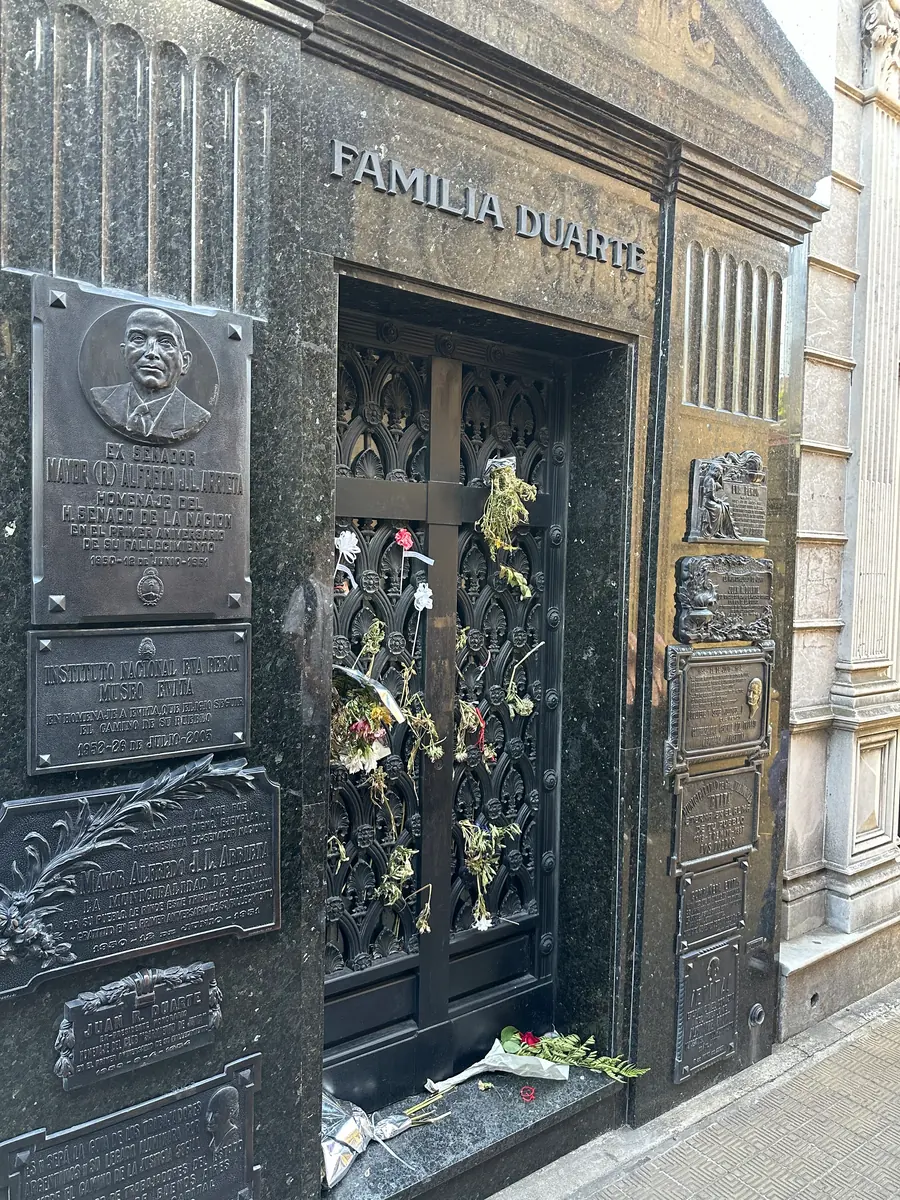 The Familia Duarte tomb in Recoleta Cemetery, where Eva Peron is buried, with flowers.