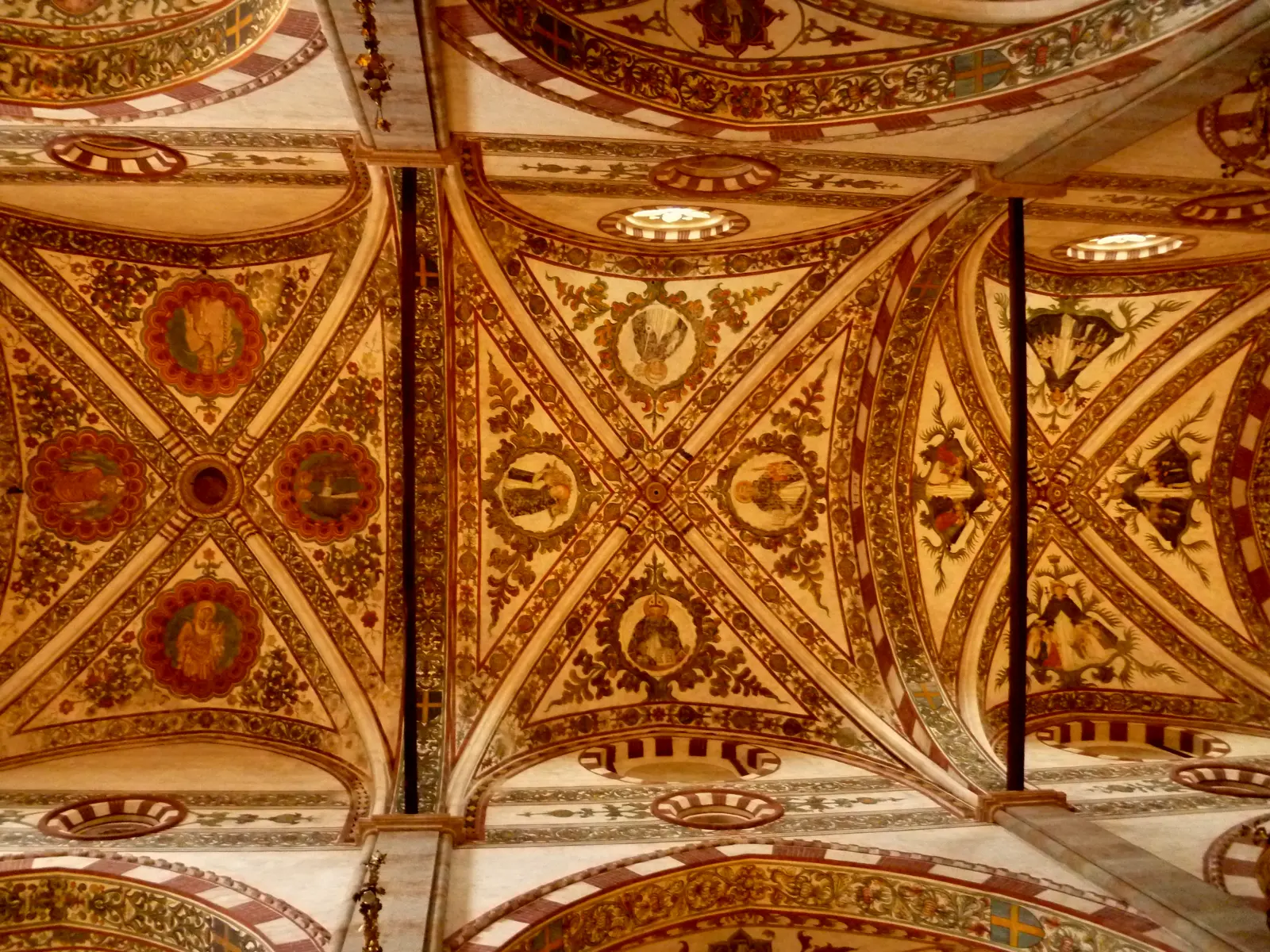 The painted vault of Santa Anastasia in Verona, ribbed and covered in floral pattern