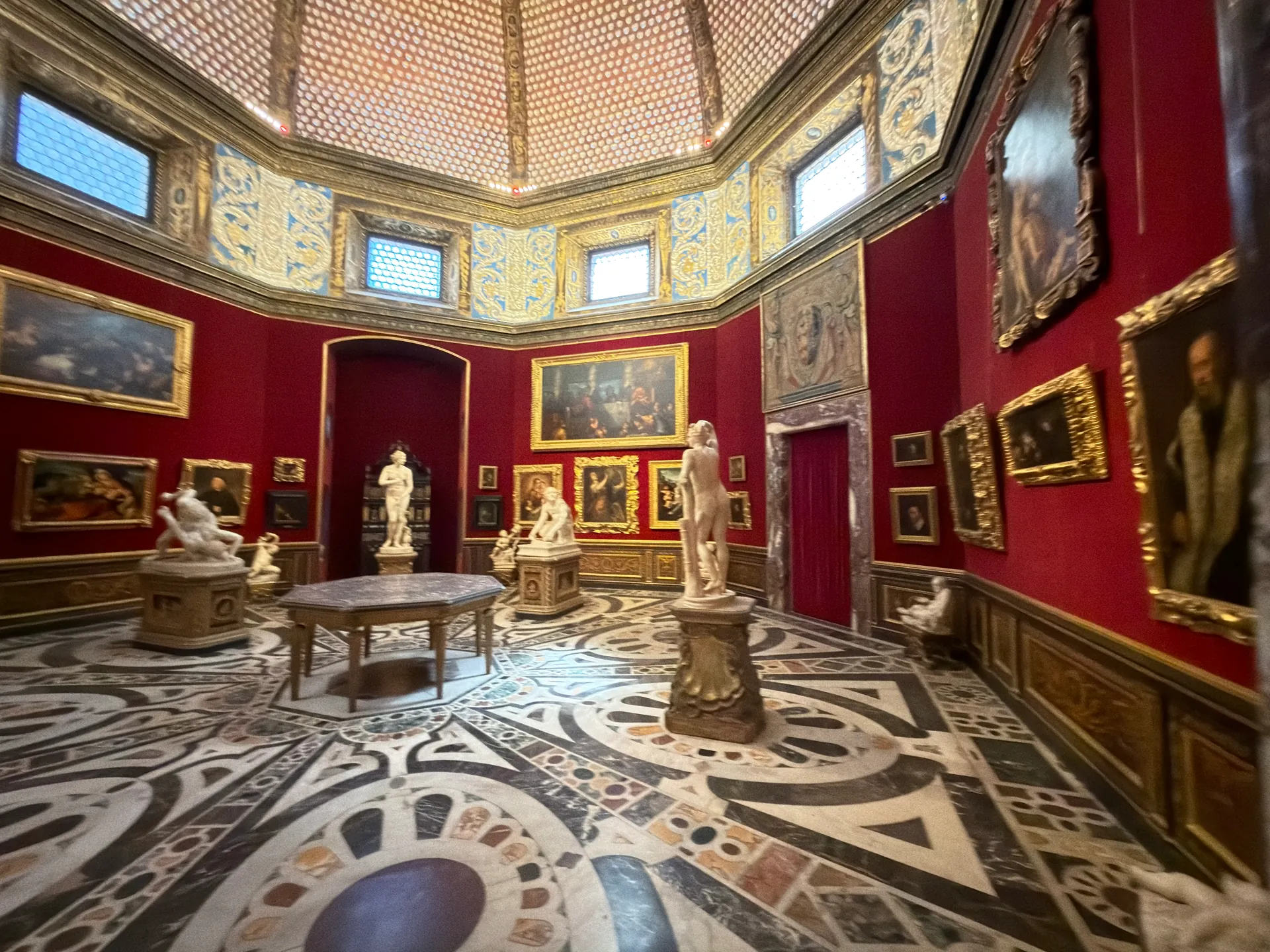 The octagonal Tribuna of the Uffizi, its pietre dure floor and mother of pearl dome empty of visitors.