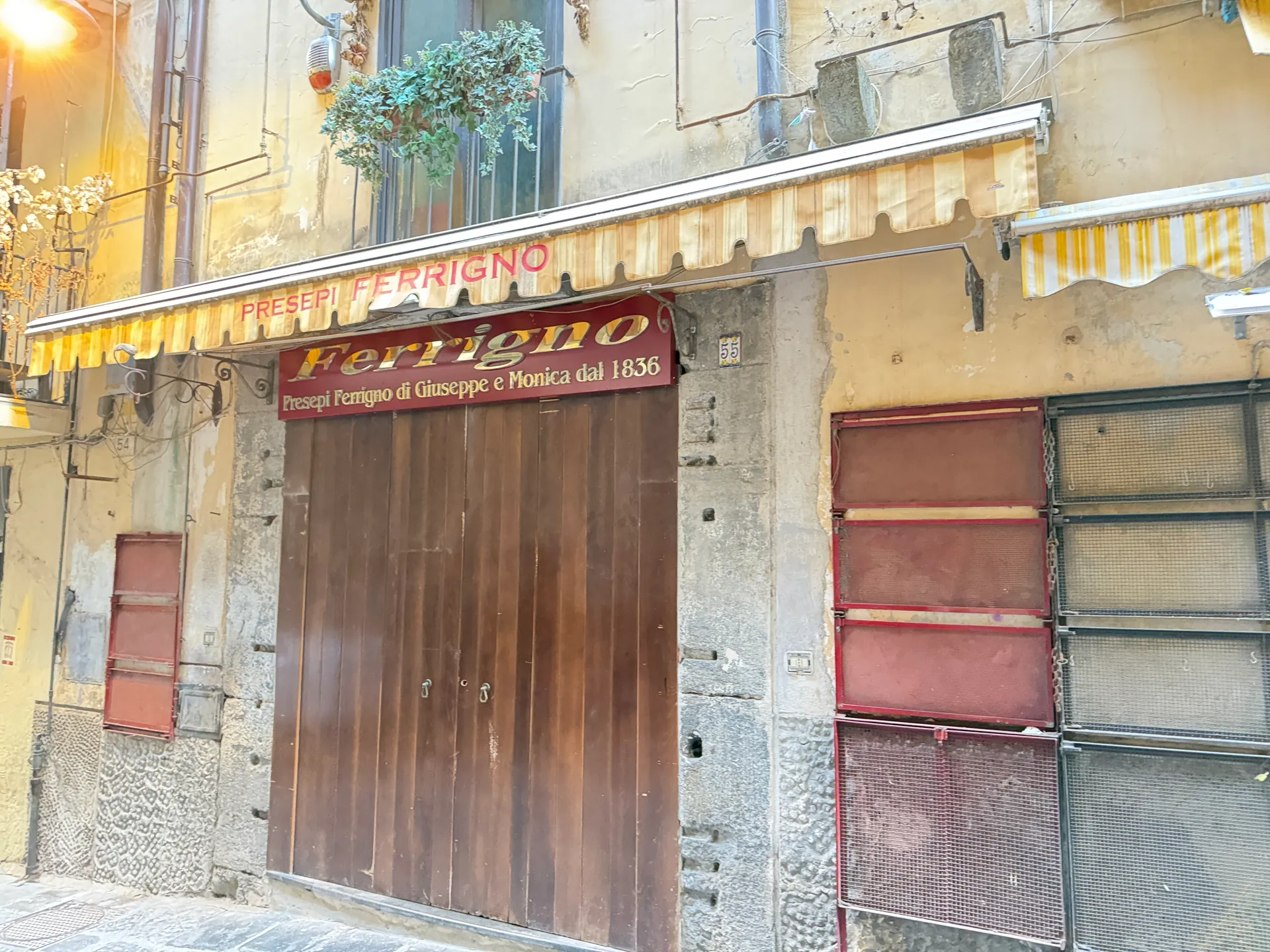 The Ferrigno shopfront and awning on San Gregorio Armeno, Naples
